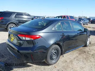 2021 Toyota Corolla Hybrid LE with VIN JTDEAMDE8MJ034218, listed as a IAAI auction lot 41692711 with 65,651 mi miles. Bid and sale history available at carsss.com. Image 4.