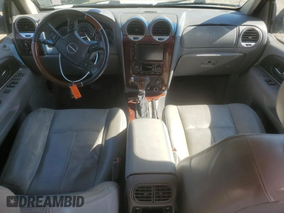 2007 GMC Envoy Denali with VIN 1GKES63M172227637, listed as a Copart auction lot 49858135 with 198,736 mi miles and Salvage Title. Bid and sale history available at carsss.com. Image 8.