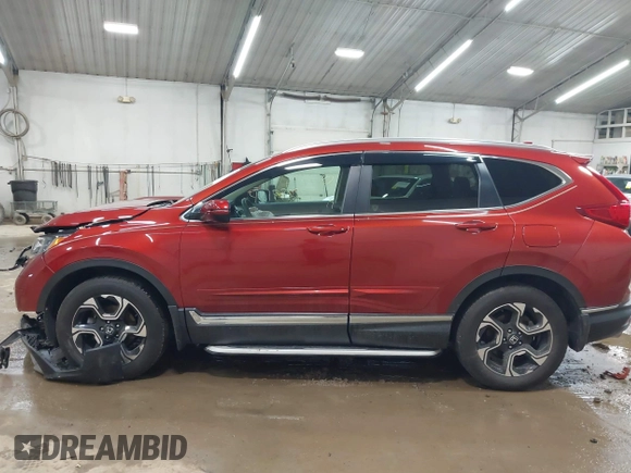 2017 Honda CR-V Touring with VIN 2HKRW2H95HH610401, listed as a IAAI auction lot 42177024 with 42,494 mi miles and . Bid and sale history available at carsss.com. Image 14.