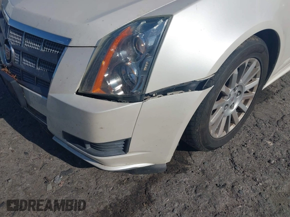 2010 Cadillac CTS Luxury with VIN 1G6DE5EG9A0118042, listed as a IAAI auction lot 42448076 with 142,359 mi miles and . Bid and sale history available at DreamBid. Image 12.