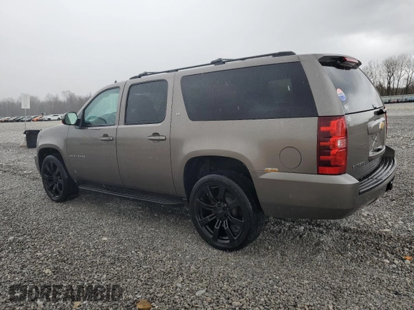 2013 Chevrolet Suburban LT with VIN 1GNSKJE77DR131188, listed as a Copart auction lot 52880375 with 147,278 mi miles and Salvage Title. Bid and sale history available at DreamBid. Image 2.
