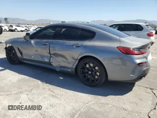 2024 BMW 8 Series 840i with VIN WBAGV2C08RCP97713, listed as a Copart auction lot 57355405 with 14,802 mi miles and Salvage title. Bid and sale history available at DreamBid. Image 2.