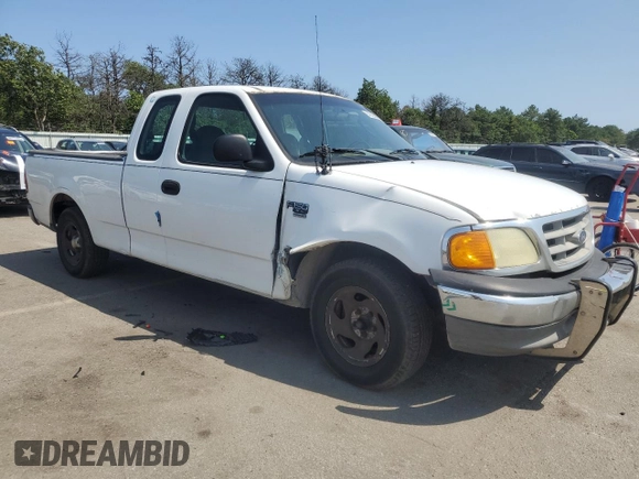 2004 Ford F-150 XL with VIN 2FTRX17W54CA63466, listed as a Copart auction lot 64022895 with 329,377 mi miles and Salvage title. Bid and sale history available at DreamBid. Image 4.