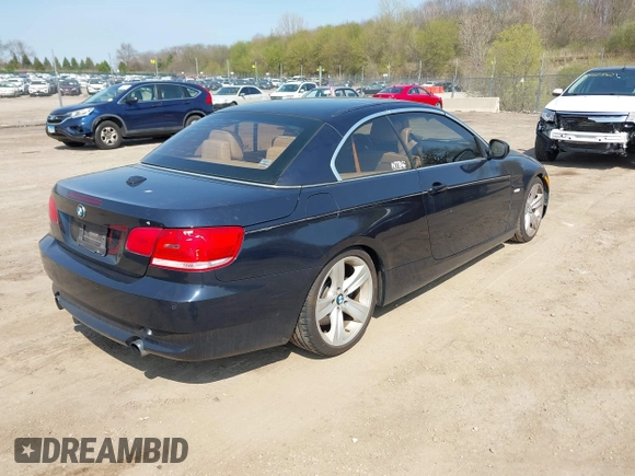 2010 BMW 3 Series 335i with VIN WBAWL7C59AP475993, listed as a IAAI auction lot 42112968 with 101,373 mi miles. Bid and sale history available at carsss.com. Image 4.