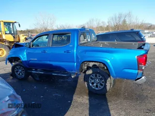 2018 Toyota Tacoma SR with VIN 3TMCZ5AN3JM138480, listed as a IAAI auction lot 41080910 with 99,225 mi miles. Bid and sale history available at carsss.com. Image 14.