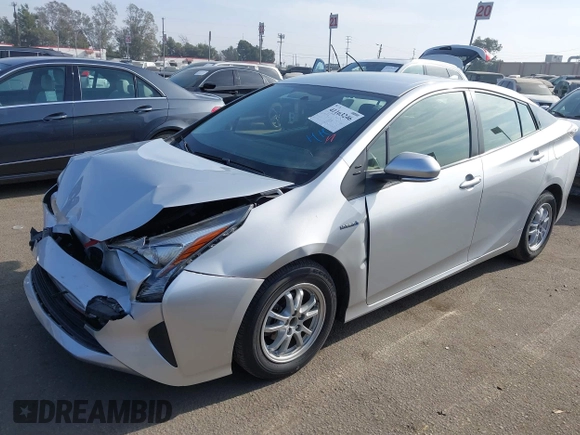 2016 Toyota Prius Two z VIN JTDKBRFU1G3016850, wystawiony jako IAAI lot #41163246 z przebiegiem 68 858 mil mil oraz . Historia ofert i sprzedaży dostępna na DreamBid. Obrazek 17.