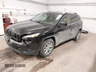 2014 Jeep Cherokee Latitude z VIN 1C4PJMCS0EW321380, wystawiony jako IAAI lot #41597508 z przebiegiem 173 991 mil mil oraz . Historia ofert i sprzedaży dostępna na DreamBid. Obrazek 2.
