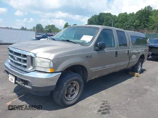 2003 Ford F-250 XL z VIN 1FTNW21LX3EC64584, wystawiony jako IAAI lot #42789502 z przebiegiem 251 574 mil mil oraz . Historia ofert i sprzedaży dostępna na DreamBid. Obrazek 2.