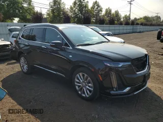 2023 Cadillac XT6 AWD Premium Luxury with VIN 1GYKPDRS6PZ185431, listed as a Copart auction lot 70475734 with 11,276 mi miles and Salvage Title. Bid and sale history available at carsss.com. Image 4.