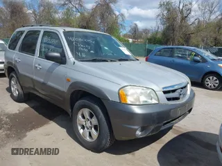 2003 Mazda Tribute LX with VIN 4F2YZ041X3KM46581, listed as a IAAI auction lot 42030054 with 45,579 mi miles and . Bid and sale history available at carsss.com. Image 1.