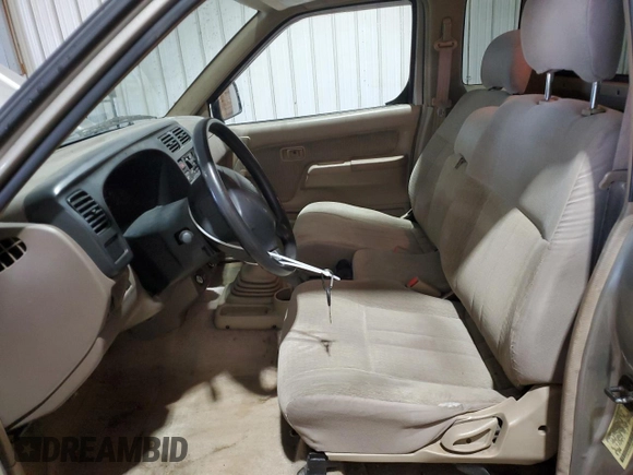 2000 Nissan Frontier XE with VIN 1N6DD26S8YC337811, listed as a Copart auction lot 54775915 with 129,427 mi miles and Salvage title. Bid and sale history available at DreamBid. Image 7.