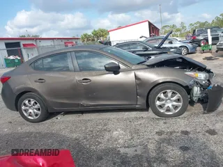 2014 Mazda 3 i Sport with VIN JM1BM1U75E1121358, listed as a IAAI auction lot 42137298 with 163,722 mi miles and . Bid and sale history available at DreamBid. Image 13.