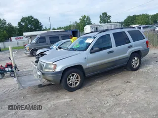 2004 Jeep Grand Cherokee Laredo z VIN 1J4GW48S94C372798, wystawiony jako IAAI lot #42812536 z przebiegiem 113 960 mil mil oraz . Historia ofert i sprzedaży dostępna na DreamBid. Obrazek 2.