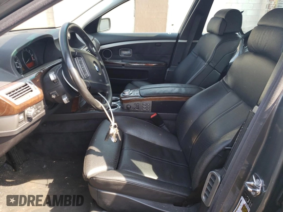 2006 BMW 7 Series 750Li with VIN WBAHN83546DT34797, listed as a Copart auction lot 60511685 with 92,565 mi miles and Salvage title. Bid and sale history available at DreamBid. Image 7.