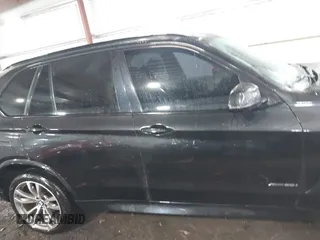 2016 BMW X5 xDrive50i with VIN 5UXKR6C55G0J80514, listed as a IAAI auction lot 41846930 with 95,817 mi miles. Bid and sale history available at carsss.com. Image 14.