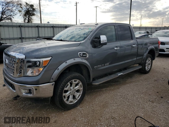 2016 Nissan Titan XD PRO-4X with VIN 1N6BA1F4XGN517824, listed as a Copart auction lot 83119324 with 150,310 mi miles and Clean Title. Bid and sale history available at carsss.com. Image 1.