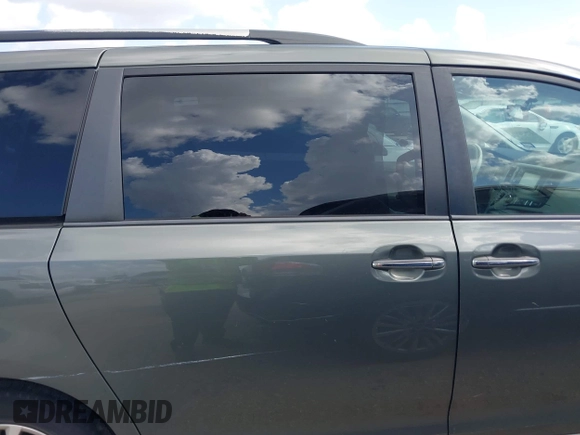 2014 Toyota Sienna XLE with VIN 5TDYK3DC2ES448876, listed as a IAAI auction lot 42519351 with 154,601 mi miles and . Bid and sale history available at DreamBid. Image 13.