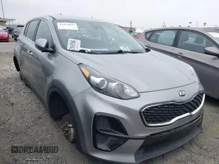 2021 Kia Sportage LX with VIN KNDPM3AC2M7931660, listed as a IAAI auction lot 41924609 with 55,512 mi miles. Bid and sale history available at carsss.com. Image 1.