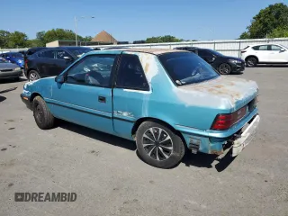 1992 Plymouth Sundance z VIN 1P3XP24D7NN120553, wystawiony jako Copart lot #68472794 z przebiegiem 148 535 mil mil oraz Szkody całkowita. Historia ofert i sprzedaży dostępna na DreamBid. Obrazek 2.
