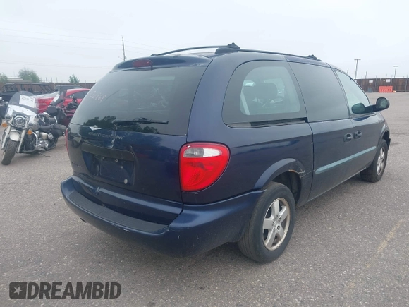 2005 Dodge Caravan SE with VIN 1D4GP24R95B420644, listed as a IAAI auction lot 42302868 with 256,701 mi miles and . Bid and sale history available at DreamBid. Image 4.
