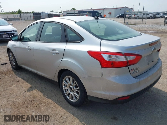 2012 Ford Focus SE with VIN 1FAHP3F22CL115653, listed as a IAAI auction lot 42380304 with 192,639 mi miles and . Bid and sale history available at DreamBid. Image 3.