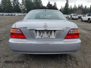 2002 Acura RL с VIN JH4KA96682C010796, выставлен на аукционе Copart как лот 42249145 с пробегом 246 683 миль миль и Списание • Salvage title. История ставок и продаж доступна на DreamBid. Изображение 6.
