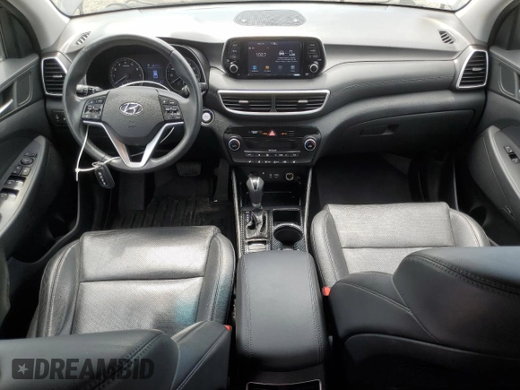 2020 Hyundai Tucson SEL with VIN KM8J3CAL6LU091225, listed as a Copart auction lot 56915555 with 66,459 mi miles and Salvage title. Bid and sale history available at DreamBid. Image 8.