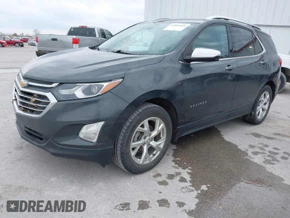 2021 Chevrolet Equinox Premier z VIN 2GNAXNEV9M6140537, wystawiony jako IAAI lot #42016514 z przebiegiem 52 237 mil mil oraz . Historia ofert i sprzedaży dostępna na DreamBid. Obrazek 17.