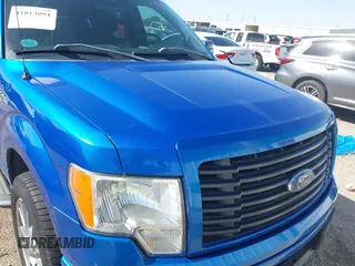 2014 Ford F-150 XL with VIN 1FTEW1CM9EFC15292, listed as a IAAI auction lot 41813091 with 125,339 mi miles. Bid and sale history available at carsss.com. Image 6.