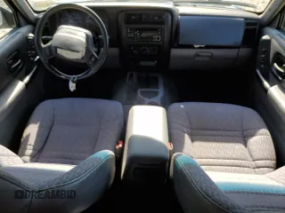 1998 Jeep Cherokee Sport with VIN 1J4FJ68S6WL283022, listed as a Copart auction lot 57451125 with 207,618 mi miles and Salvage title. Bid and sale history available at DreamBid. Image 8.