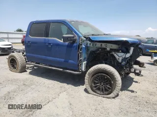 2023 Ford F-150 XL with VIN 1FTFW1E8XPKE23518, listed as a Copart auction lot 60340975 with 11,661 mi miles and Salvage title. Bid and sale history available at DreamBid. Image 4.