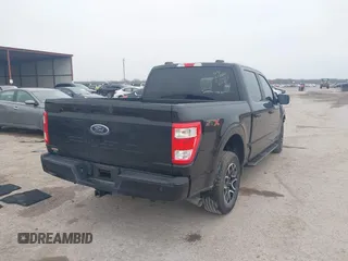 2023 Ford F-150 XL with VIN 1FTEW1C55PKD01184, listed as a IAAI auction lot 41700658 with 18,804 mi miles. Bid and sale history available at carsss.com. Image 4.