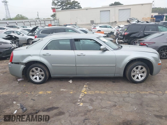 2006 Chrysler 300 Touring with VIN 2C3KA53G56H112376, listed as a IAAI auction lot 41919098 with 309,184 mi miles. Bid and sale history available at carsss.com. Image 13.