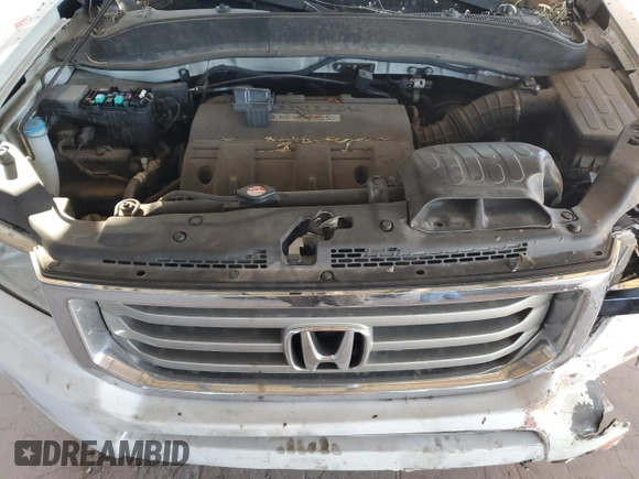 2014 Honda Ridgeline RTL z VIN 5FPYK1F51EB011627, wystawiony jako Copart lot #88334645 z przebiegiem 137 494 mil mil oraz Szkoda całkowita • Salvage title. Historia ofert i sprzedaży dostępna na DreamBid. Obrazek 11.