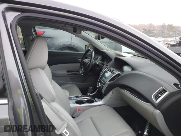 2019 Acura TLX with VIN 19UUB1F36KA004085, listed as a IAAI auction lot 41664344 with 115,125 mi miles. Bid and sale history available at carsss.com. Image 5.