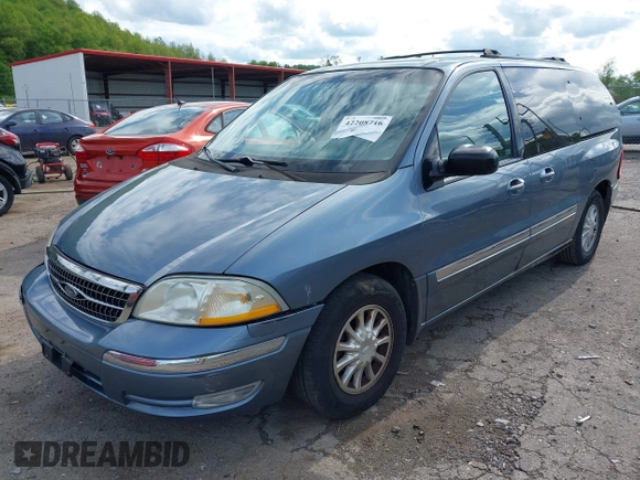 1999 Ford Windstar SE with VIN 2FMZA5240XBC66771, listed as a IAAI auction lot 42208716 with 143,764 mi miles and . Bid and sale history available at carsss.com. Image 2.