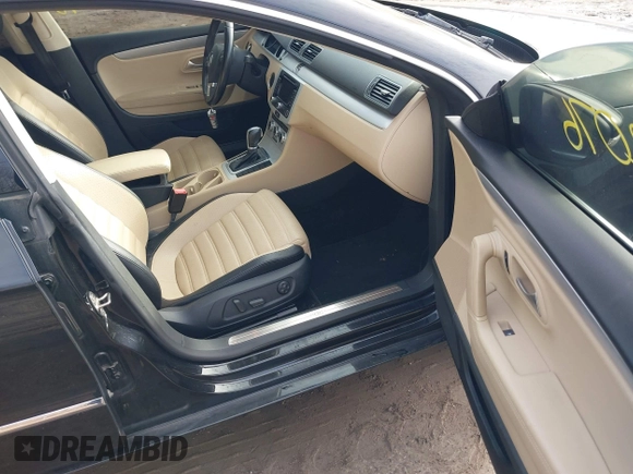 2014 Volkswagen CC Sport with VIN WVWBP7AN4EE534247, listed as a IAAI auction lot 41542076 with 119,199 mi miles and . Bid and sale history available at DreamBid. Image 5.