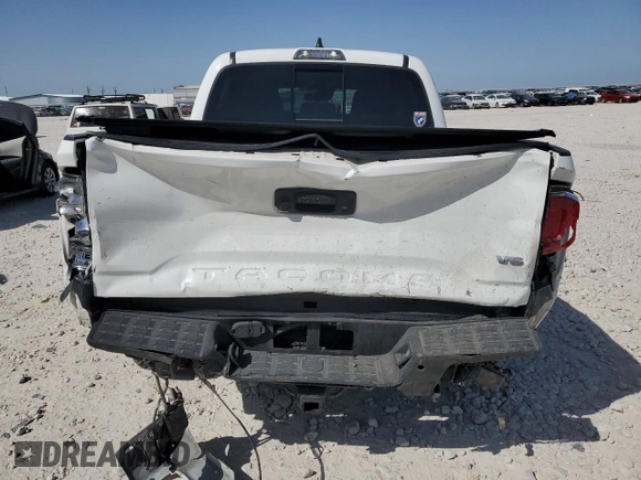 2021 Toyota Tacoma SR z VIN 3TMCZ5AN8MM387166, wystawiony jako Copart lot #49952935 z przebiegiem 63 175 mil mil oraz Szkoda całkowita • Salvage title. Historia ofert i sprzedaży dostępna na DreamBid. Obrazek 6.