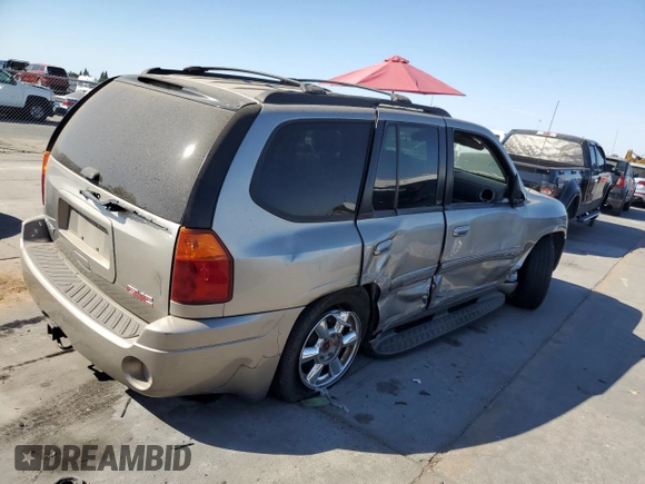2003 GMC Envoy SLT with VIN 1GKDT13S832327481, listed as a Copart auction lot 72253474 with Not Provided miles and Salvage Title. Bid and sale history available at DreamBid. Image 3.