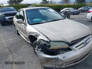 2001 Honda Accord EX z VIN 1HGCG66821A084618, wystawiony jako IAAI lot #41959020 z przebiegiem 272 671 mil mil oraz . Historia ofert i sprzedaży dostępna na DreamBid. Obrazek 6.