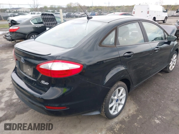 2019 Ford Fiesta SE with VIN 3FADP4BJ7KM105246, listed as a IAAI auction lot 42039557 with 48,186 mi miles. Bid and sale history available at carsss.com. Image 4.