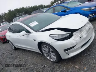 2018 Tesla Model 3 Long Range Battery z VIN 5YJ3E1EB8JF135728, wystawiony jako IAAI lot #41863870 z przebiegiem 124 053 mil mil oraz . Historia ofert i sprzedaży dostępna na DreamBid. Obrazek 13.