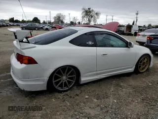 2002 Acura RSX Auto with VIN JH4DC548X2C034663, listed as a Copart auction lot 55980275 with 165,809 mi miles and Salvage title. Bid and sale history available at DreamBid. Image 3.