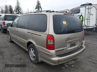 1998 Oldsmobile Silhouette GL z VIN 1GHDX03E8WD199007, wystawiony jako IAAI lot #41642100 z przebiegiem 184 722 mil mil oraz . Historia ofert i sprzedaży dostępna na DreamBid. Obrazek 3.