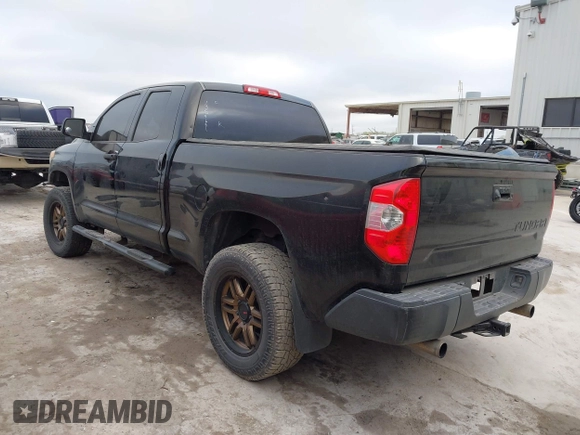 2014 Toyota Tundra 4WD Truck SR with VIN 5TFUM5F14EX051843, listed as a IAAI auction lot 41773983 with 145,089 mi miles. Bid and sale history available at carsss.com. Image 3.