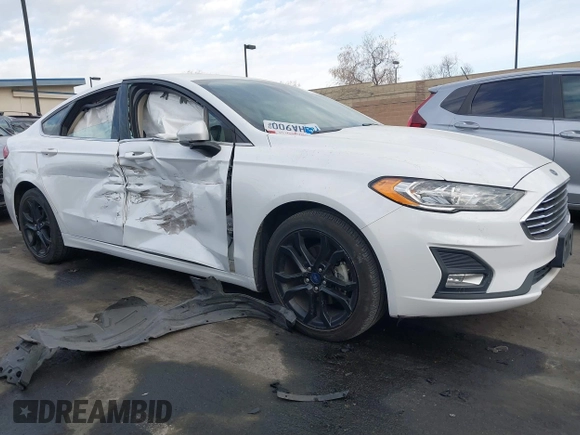 2019 Ford Fusion SE with VIN 3FA6P0HD7KR200699, listed as a IAAI auction lot 41686546 with 89,715 mi miles. Bid and sale history available at carsss.com. Image 6.