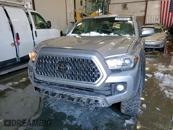2018 Toyota Tacoma SR z VIN 3TMCZ5AN2JM122416, wystawiony jako Copart lot #41620015 z przebiegiem Nie podano mil oraz Szkoda całkowita • Salvage title. Historia ofert i sprzedaży dostępna na DreamBid. Obrazek 13.