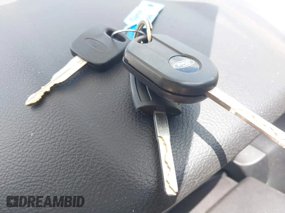 2013 Ford Focus SE with VIN 1FADP3F21DL266919, listed as a IAAI auction lot 42537094 with 147,081 mi miles and . Bid and sale history available at DreamBid. Image 11.