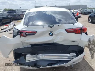 2025 BMW X2 xDrive28i with VIN WBX63GM06S5066386, listed as a IAAI auction lot 41812615 with 1,598 mi miles. Bid and sale history available at carsss.com. Image 6.