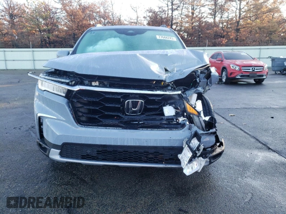 2024 Honda Pilot Touring with VIN 5FNYG1H72RB006807, listed as a Copart auction lot 77688243 with 1,331 mi miles and Salvage Title. Bid and sale history available at carsss.com. Image 5.